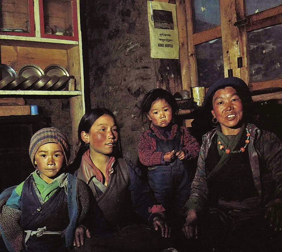 Sherpa family posing together for a portrait